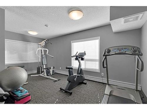 301-390 Marina Drive, Chestermere, AB - Indoor Photo Showing Gym Room