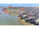 301-390 Marina Drive, Chestermere, AB  - Outdoor With Body Of Water With View 