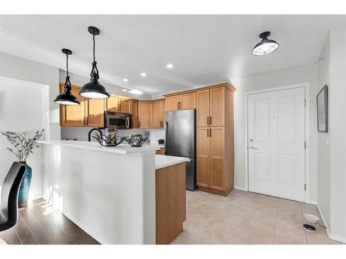 301-390 Marina Drive, Chestermere, AB - Indoor Photo Showing Kitchen