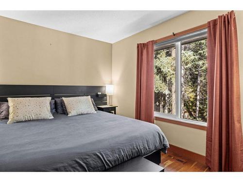 50 Ridge Road, Canmore, AB - Indoor Photo Showing Bedroom