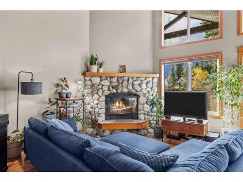 50 Ridge Road, Canmore, AB - Indoor Photo Showing Living Room With Fireplace