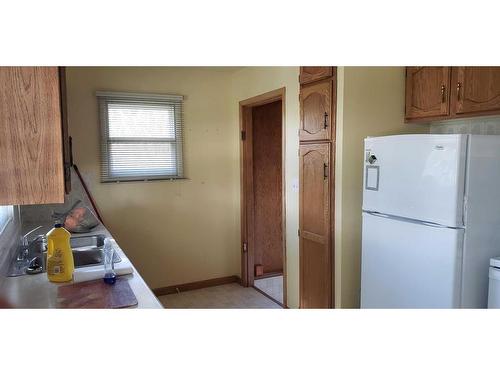 303 Armstrong Street, Carmangay, AB - Indoor Photo Showing Kitchen