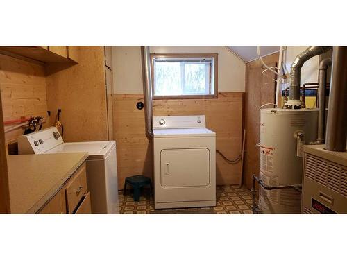 303 Armstrong Street, Carmangay, AB - Indoor Photo Showing Laundry Room