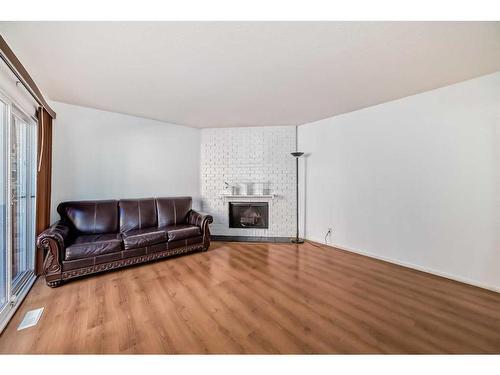 55-287 Southampton Drive Sw, Calgary, AB - Indoor Photo Showing Living Room With Fireplace