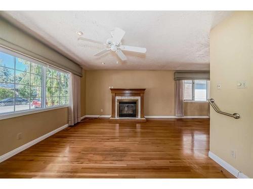 8016 7 Street Sw, Calgary, AB - Indoor With Fireplace