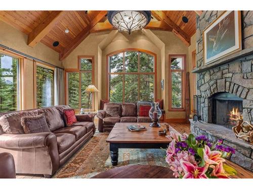 163 Cairns Landing, Canmore, AB - Indoor Photo Showing Living Room With Fireplace