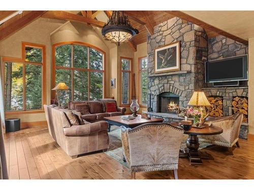 163 Cairns Landing, Canmore, AB - Indoor Photo Showing Living Room With Fireplace