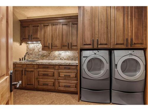 163 Cairns Landing, Canmore, AB - Indoor Photo Showing Laundry Room