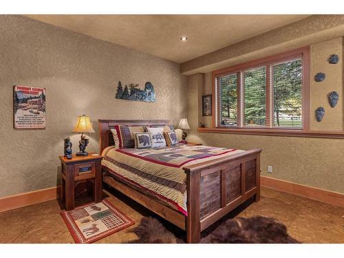 163 Cairns Landing, Canmore, AB - Indoor Photo Showing Bedroom