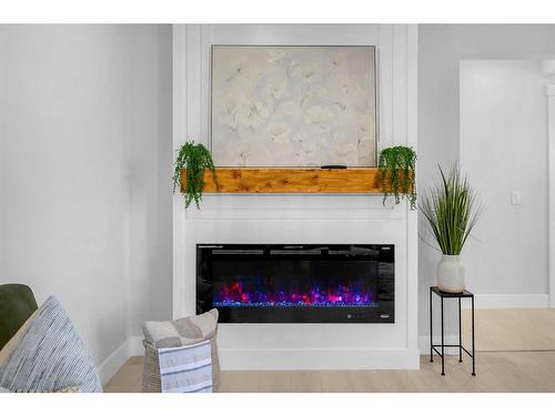 755 Penbrooke Road Se, Calgary, AB - Indoor With Fireplace