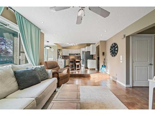 61 Riverside Circle Se, Calgary, AB - Indoor Photo Showing Living Room