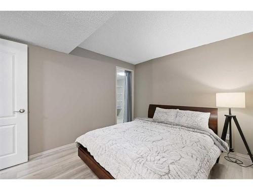 61 Riverside Circle Se, Calgary, AB - Indoor Photo Showing Bedroom