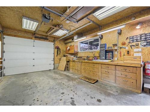 61 Riverside Circle Se, Calgary, AB - Indoor Photo Showing Garage