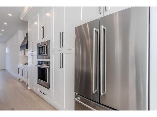 1712 18 Avenue Nw, Calgary, AB - Indoor Photo Showing Kitchen With Stainless Steel Kitchen