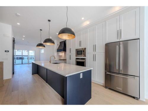 1712 18 Avenue Nw, Calgary, AB - Indoor Photo Showing Kitchen With Stainless Steel Kitchen With Upgraded Kitchen