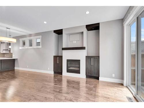 2827A 40 Street Sw, Calgary, AB - Indoor With Fireplace