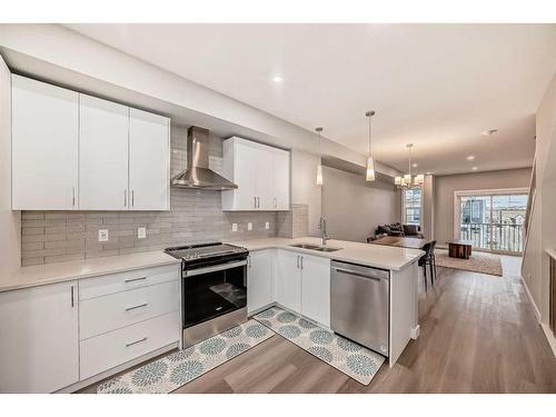 1148 Sage Hill Grove Nw, Calgary, AB - Indoor Photo Showing Kitchen With Double Sink With Upgraded Kitchen