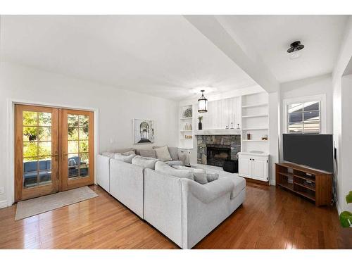 8 Sunmount Gardens Se, Calgary, AB - Indoor Photo Showing Living Room With Fireplace