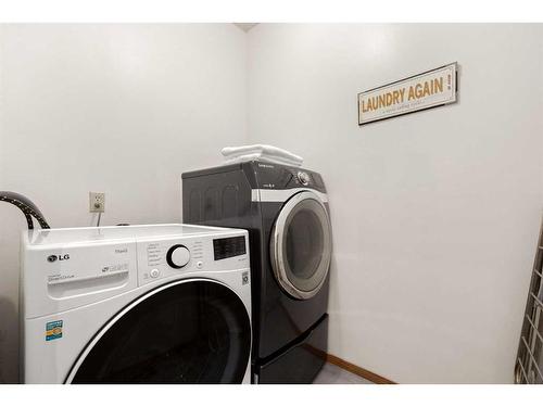 8 Sunmount Gardens Se, Calgary, AB - Indoor Photo Showing Laundry Room