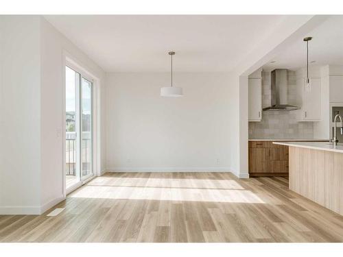 203 Silver Spruce Grove Sw, Calgary, AB - Indoor Photo Showing Kitchen