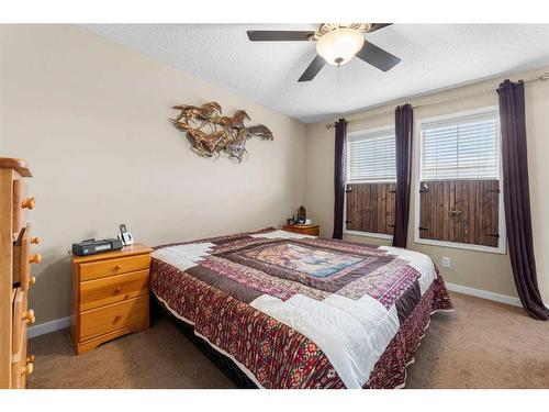 1118 New Brighton Park Se, Calgary, AB - Indoor Photo Showing Bedroom