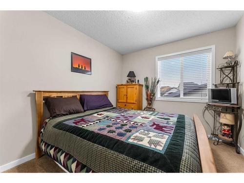 1118 New Brighton Park Se, Calgary, AB - Indoor Photo Showing Bedroom