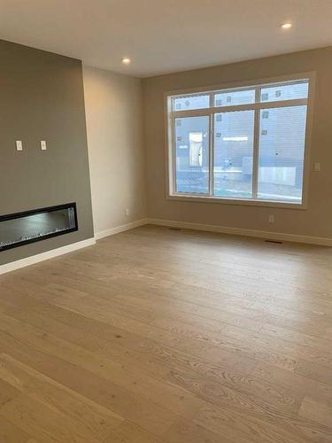 128 Crimson Ridge Place Nw, Calgary, AB - Indoor Photo Showing Living Room