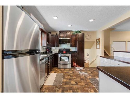 216 Ranch Estates Place Nw, Calgary, AB - Indoor Photo Showing Kitchen With Stainless Steel Kitchen