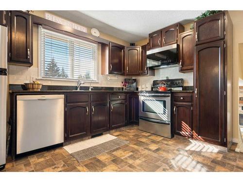 216 Ranch Estates Place Nw, Calgary, AB - Indoor Photo Showing Kitchen With Stainless Steel Kitchen