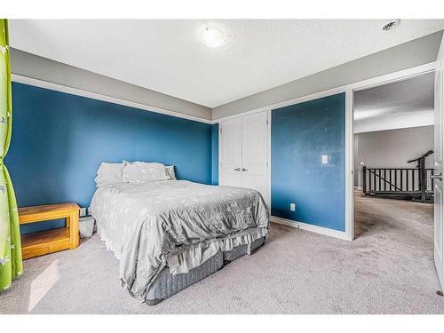 6 Cranbrook Hill Se, Calgary, AB - Indoor Photo Showing Bedroom