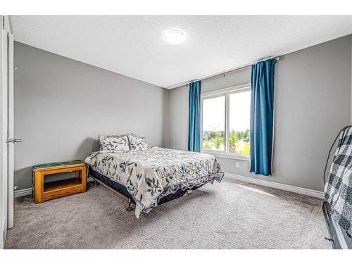 6 Cranbrook Hill Se, Calgary, AB - Indoor Photo Showing Bedroom