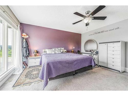 6 Cranbrook Hill Se, Calgary, AB - Indoor Photo Showing Bedroom