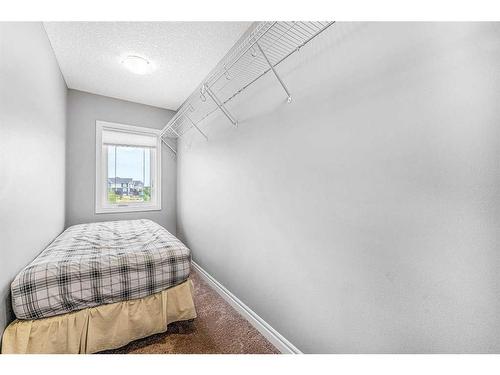 6 Cranbrook Hill Se, Calgary, AB - Indoor Photo Showing Bedroom