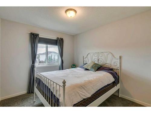 154 Autumn Crescent Se, Calgary, AB - Indoor Photo Showing Bedroom