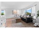 1639 Erin Drive Se, Airdrie, AB  - Indoor Photo Showing Living Room 