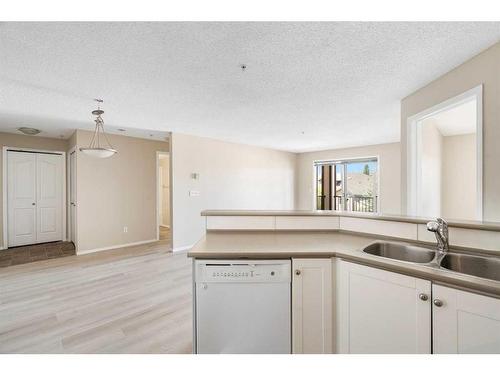 4306-60 Panatella Street Nw, Calgary, AB - Indoor Photo Showing Kitchen With Double Sink