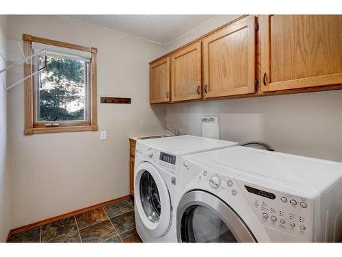 311 Hawkdale Bay Nw, Calgary, AB - Indoor Photo Showing Laundry Room