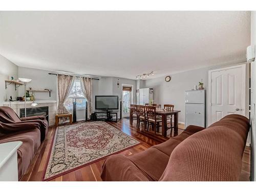 246 Taracove Place Ne, Calgary, AB - Indoor Photo Showing Living Room