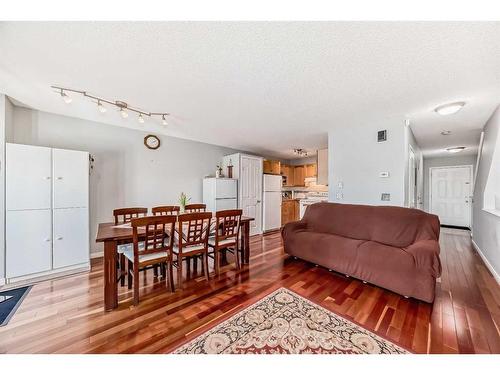 246 Taracove Place Ne, Calgary, AB - Indoor Photo Showing Living Room