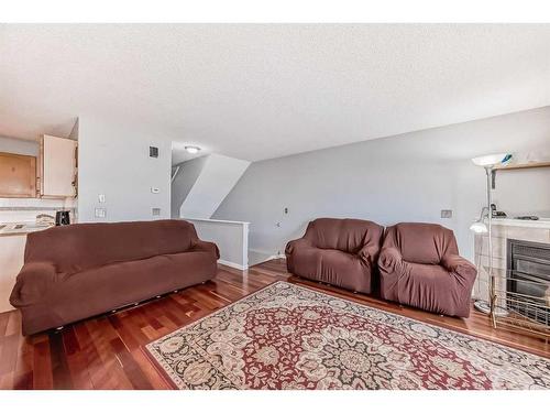 246 Taracove Place Ne, Calgary, AB - Indoor Photo Showing Living Room