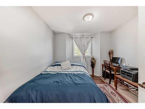 246 Taracove Place Ne, Calgary, AB - Indoor Photo Showing Bedroom