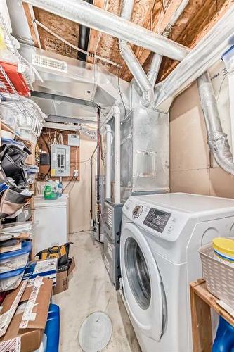 246 Taracove Place Ne, Calgary, AB - Indoor Photo Showing Laundry Room