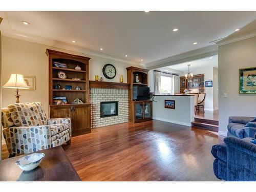 2219 26A Street Sw, Calgary, AB - Indoor Photo Showing Living Room With Fireplace