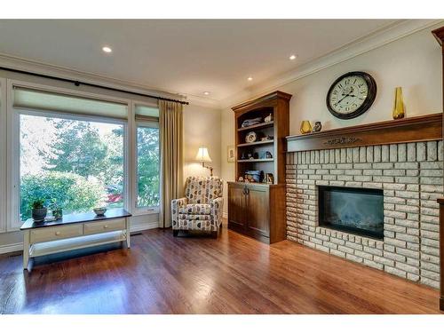 2219 26A Street Sw, Calgary, AB - Indoor Photo Showing Living Room With Fireplace