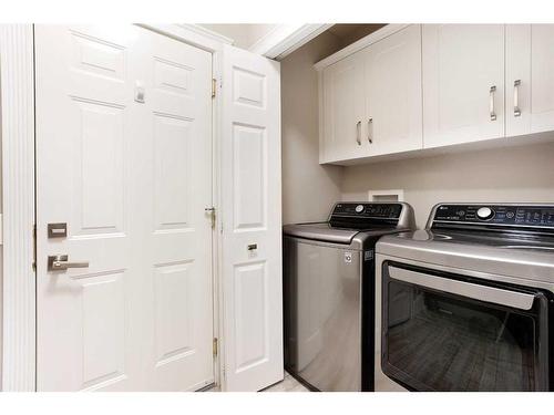 1043 Bridlemeadows Manor Sw, Calgary, AB - Indoor Photo Showing Laundry Room