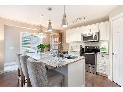 1043 Bridlemeadows Manor Sw, Calgary, AB - Indoor Photo Showing Kitchen