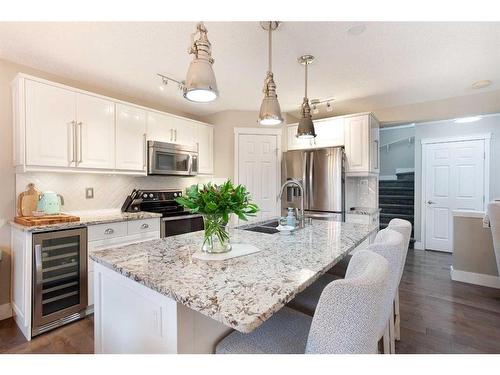 1043 Bridlemeadows Manor Sw, Calgary, AB - Indoor Photo Showing Kitchen With Upgraded Kitchen