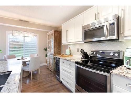 1043 Bridlemeadows Manor Sw, Calgary, AB - Indoor Photo Showing Kitchen With Upgraded Kitchen