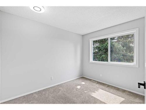 82 Taraglen Road Ne, Calgary, AB - Indoor Photo Showing Other Room