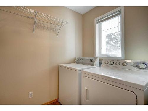 1342 Somerside Drive Sw, Calgary, AB - Indoor Photo Showing Laundry Room